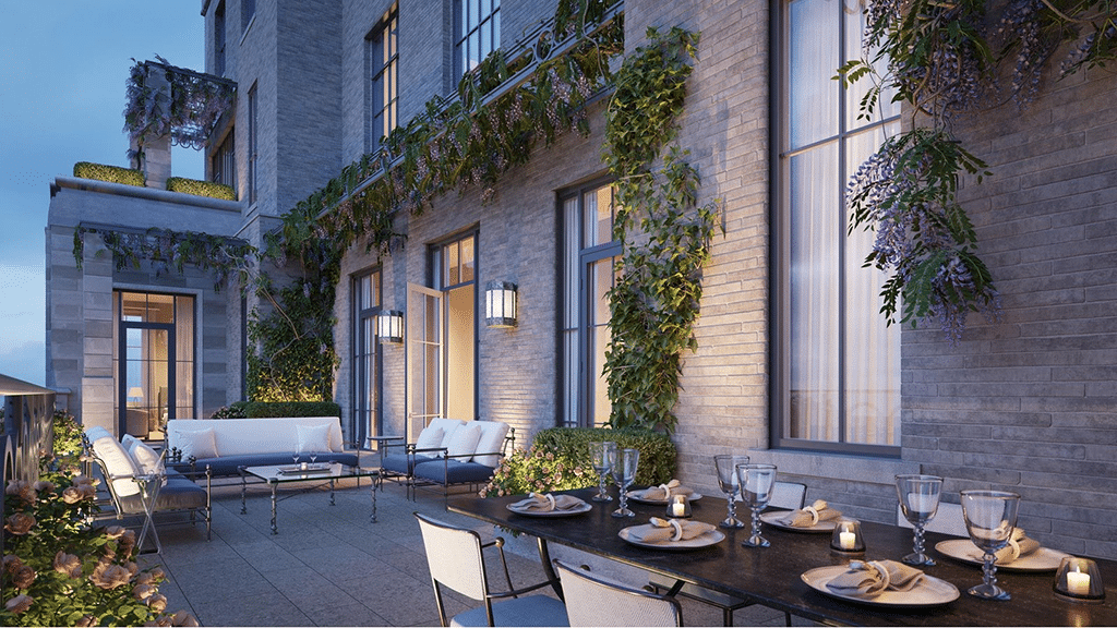 luxury property with terrace and wisteria climbing the walls.