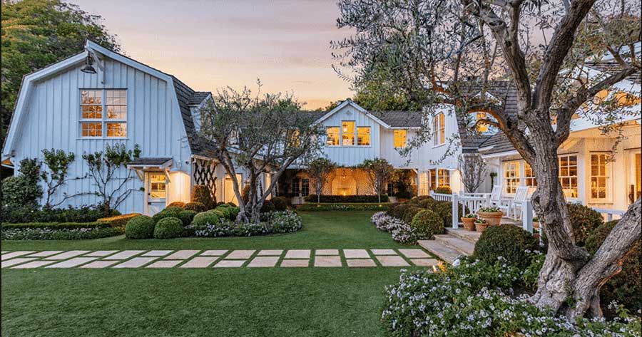 Manicured lawn with ornamental shrubs and trees