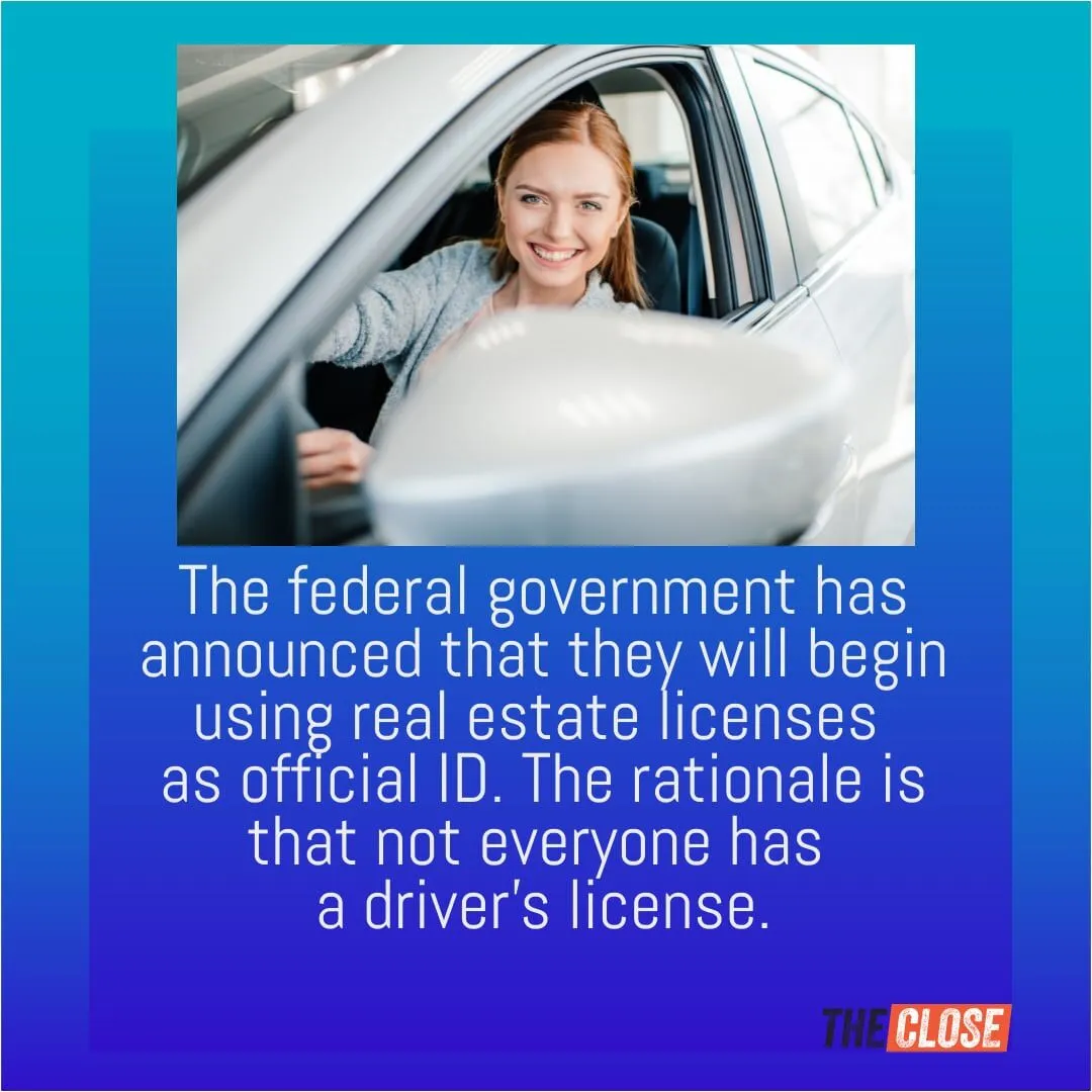 A woman smiling while sitting in the driver seat of a car and looking out the window