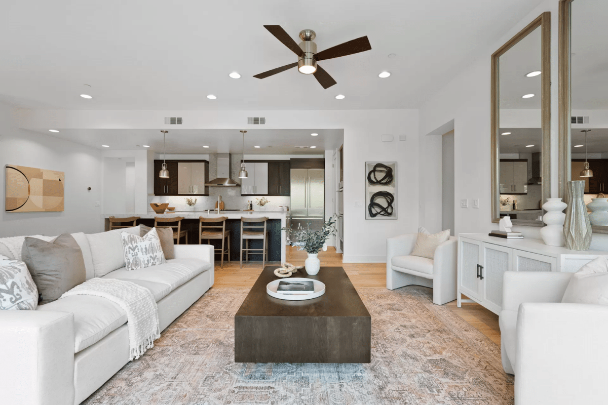 A staged living room and kitchen