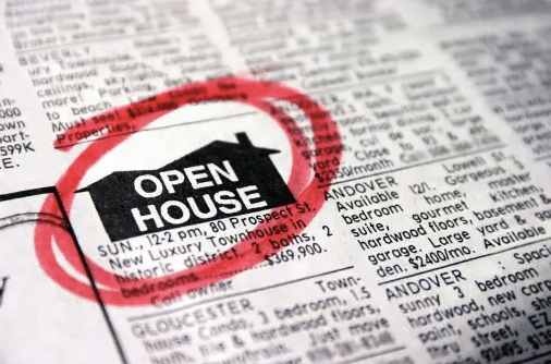 Classified ad in a newspaper showing an open house.