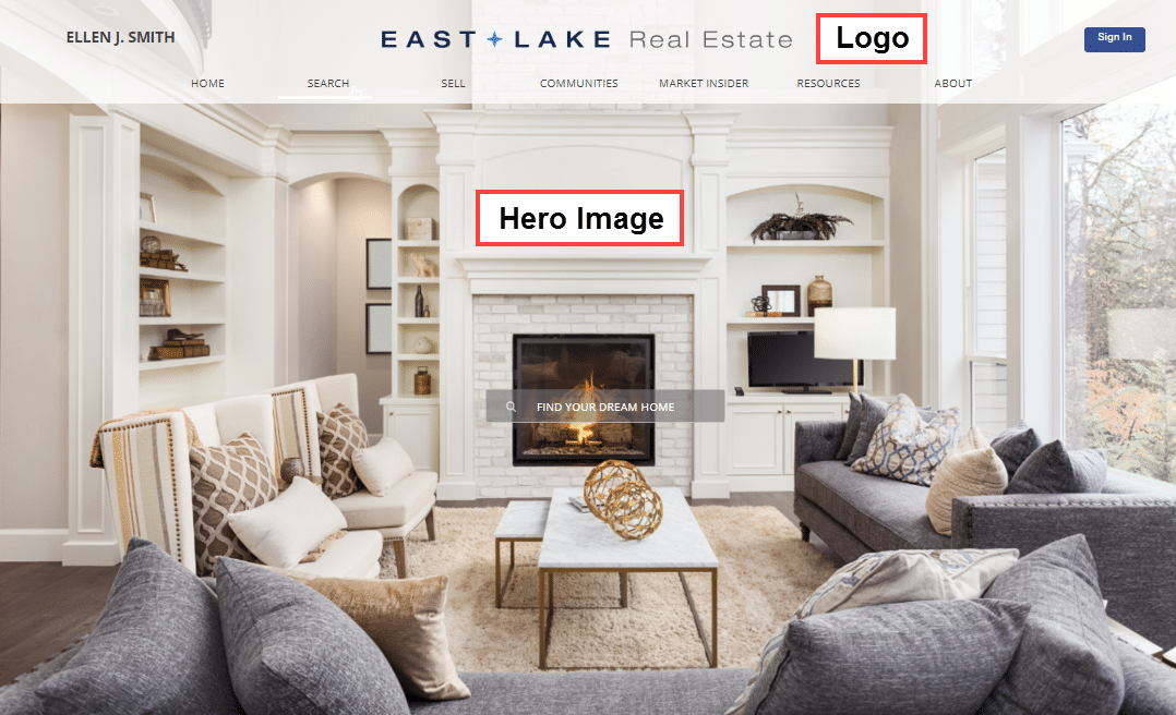 Living room with white walls and grey furniture as hero image on website