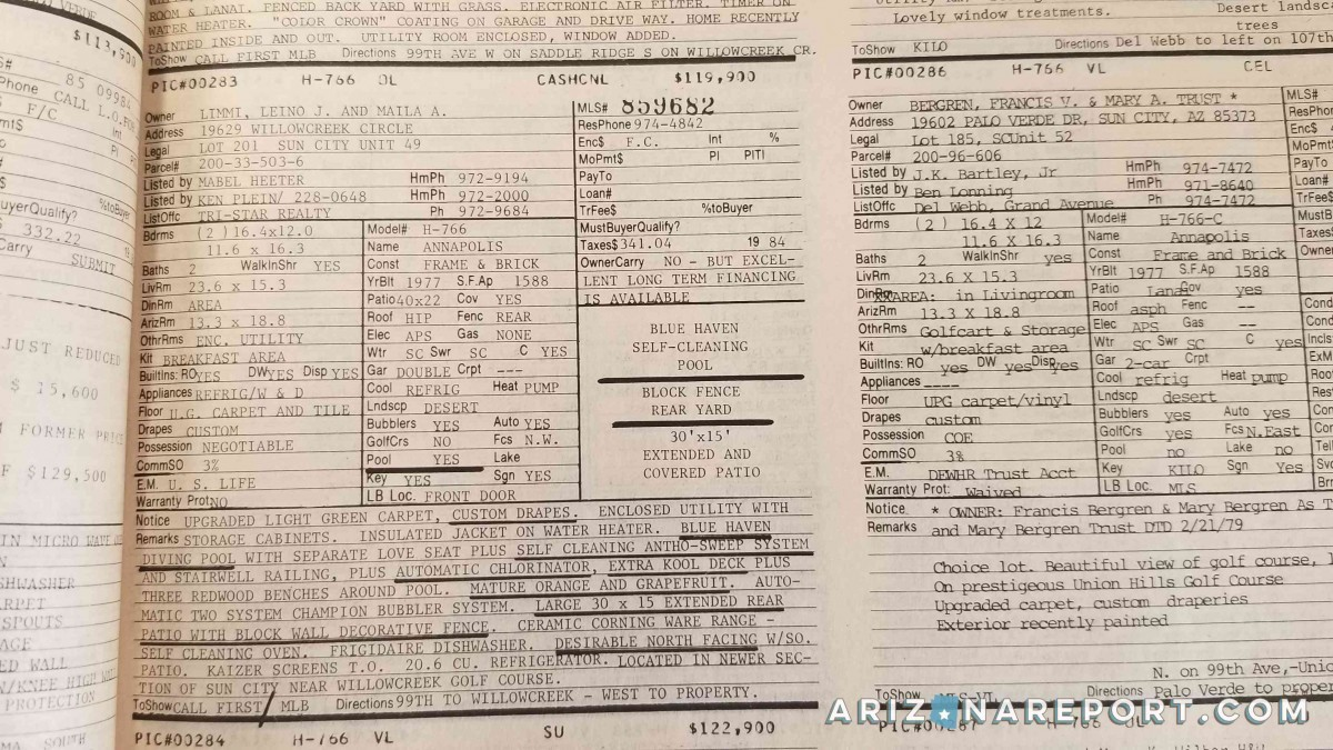 An original MLS listing book with property details typed out across pages.