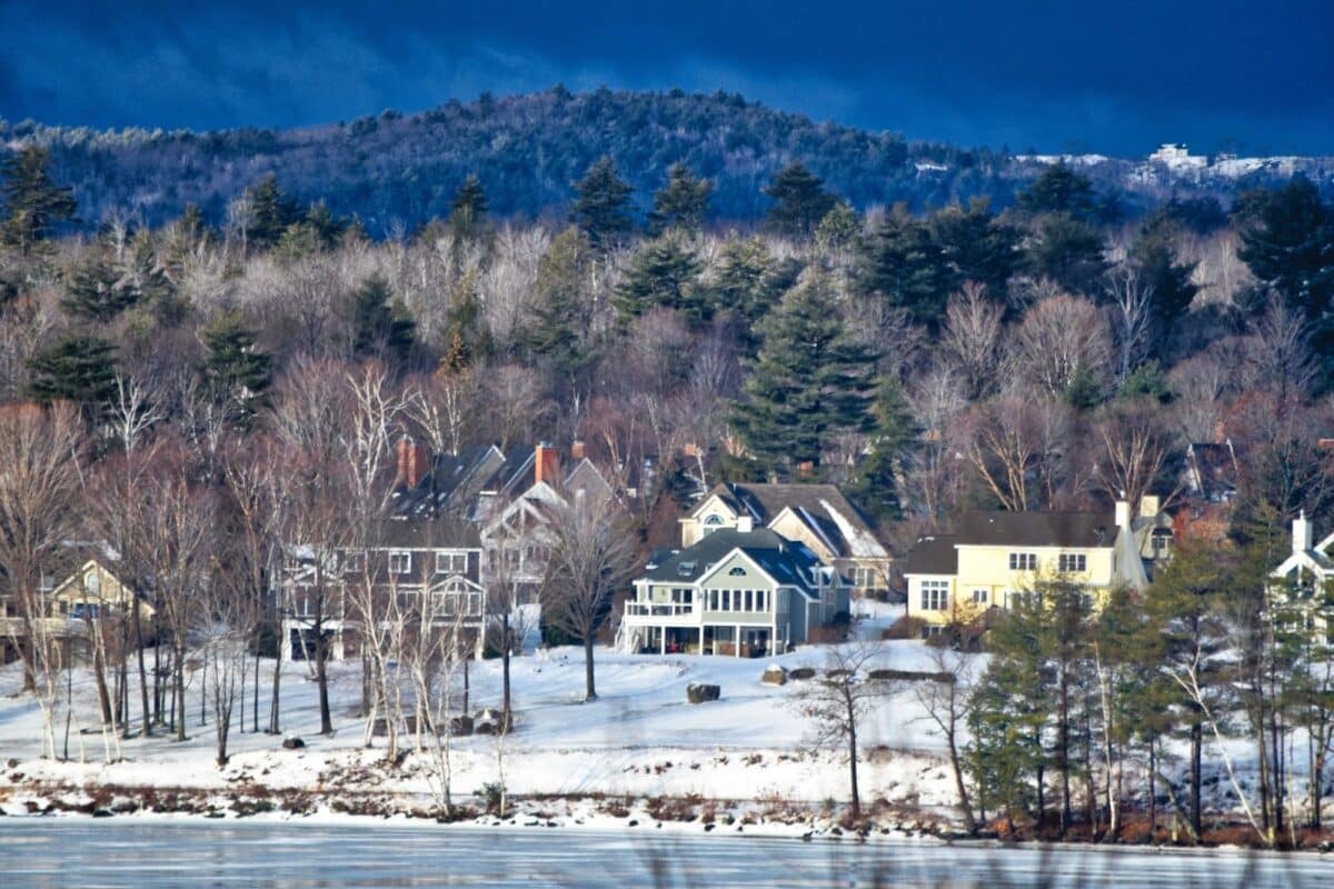 Lakeside community covered in snow after a blizzard.