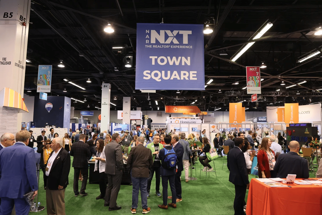 NAR members gather in the expo hall of the annual real estate convention.