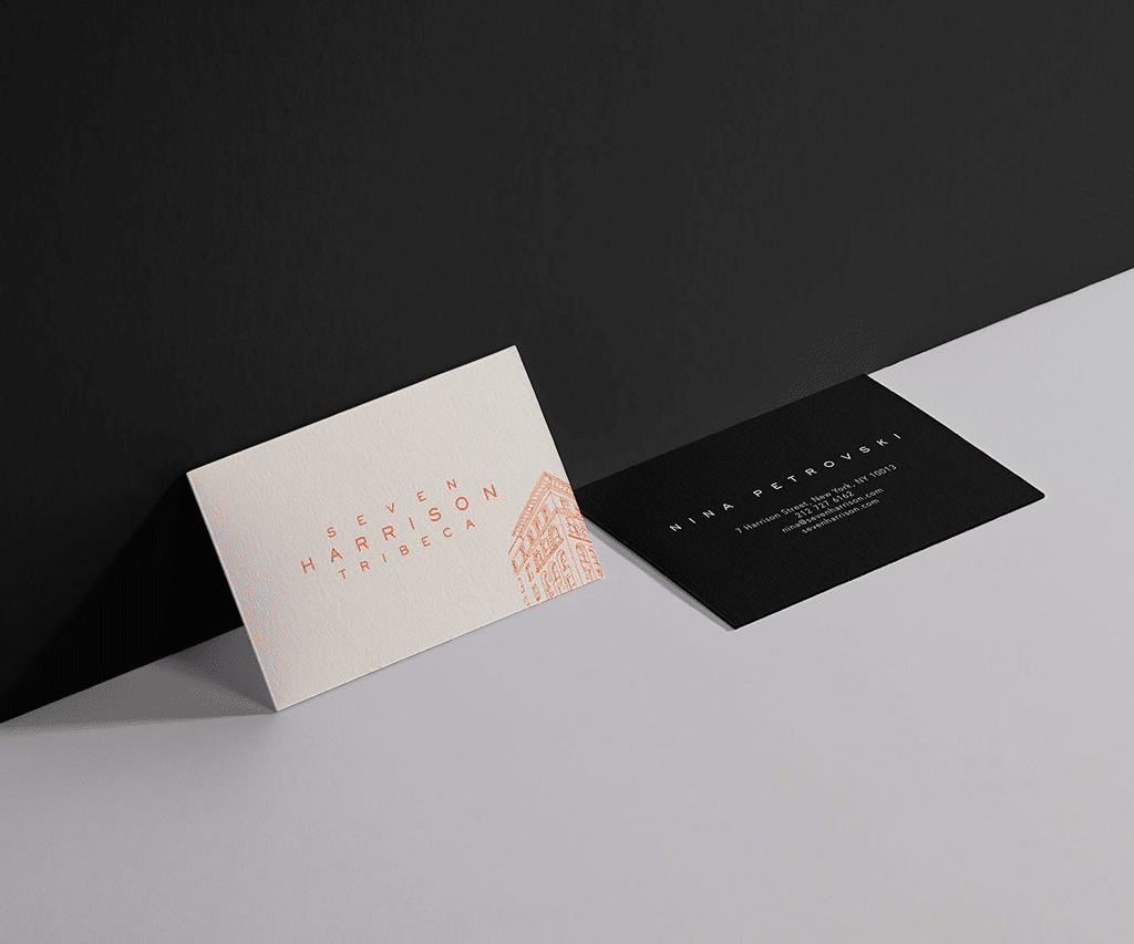 Orange and cream business card with a sleek black back