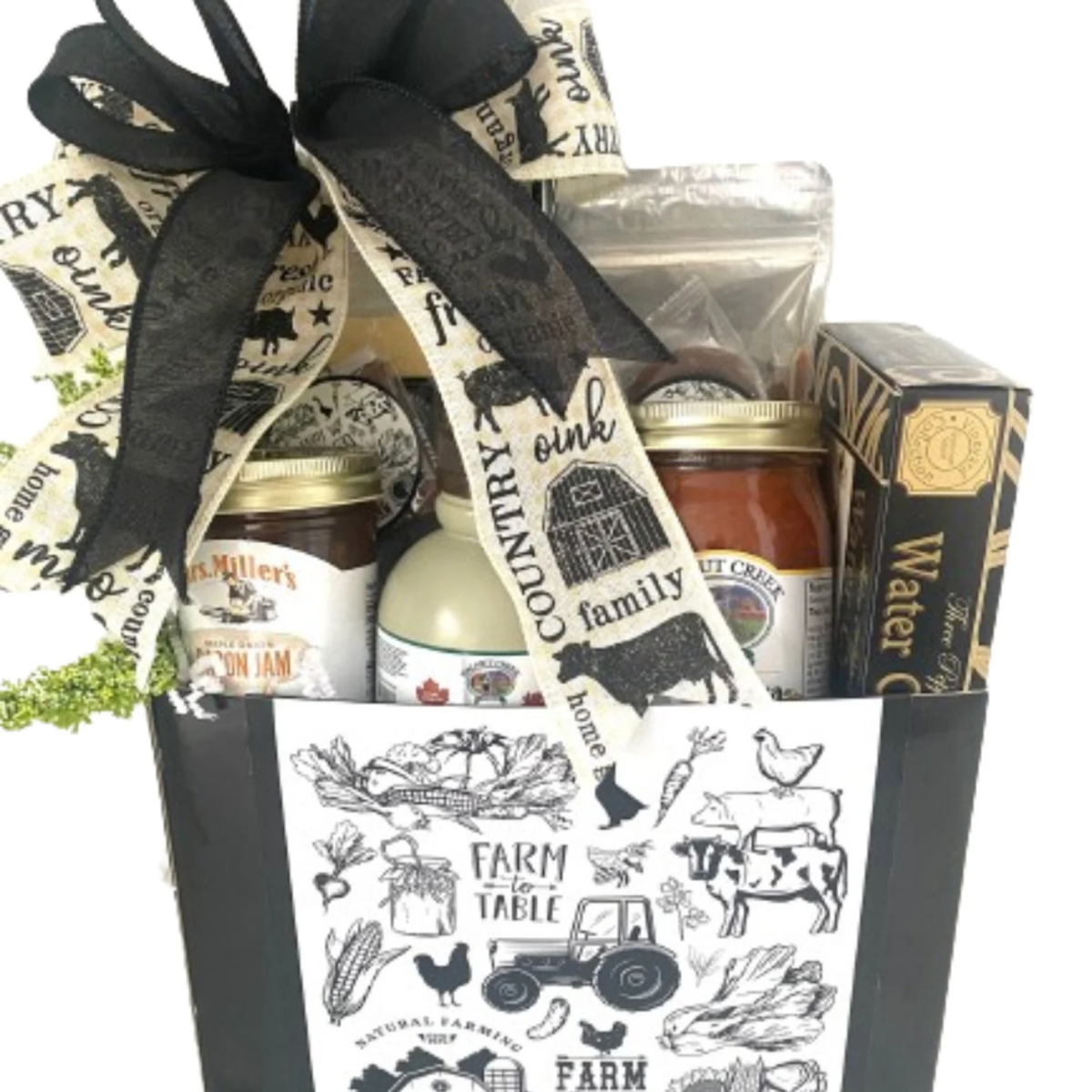 A gift basket with assorted farm-to-table products: corn salsa, maple syrup, pretzel, crackers, cheese, soup mix