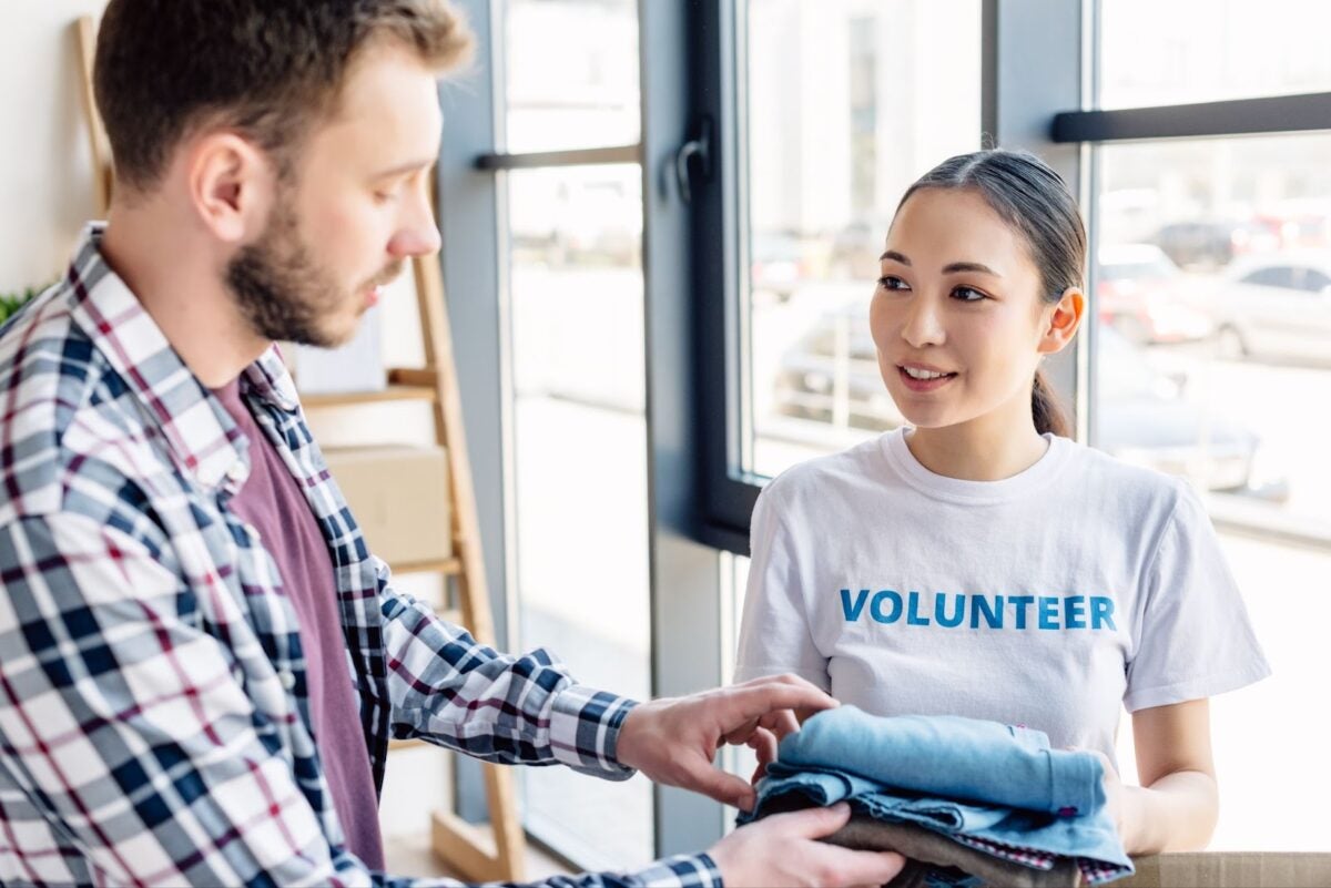 Real estate agent volunteering at a local community event