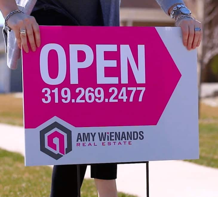 White and magenta open house sign