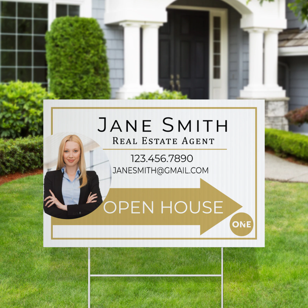 Real estate open house sign with a realtor headshot