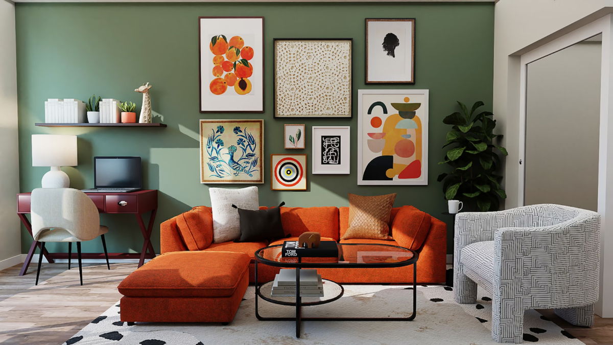 Living room with an orange couch, coffee table with books, and a wall with framed art