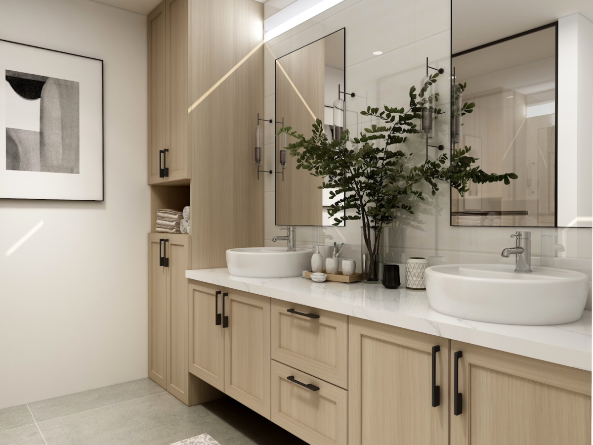 A bathroom with soap dispensers and a plant on the counter