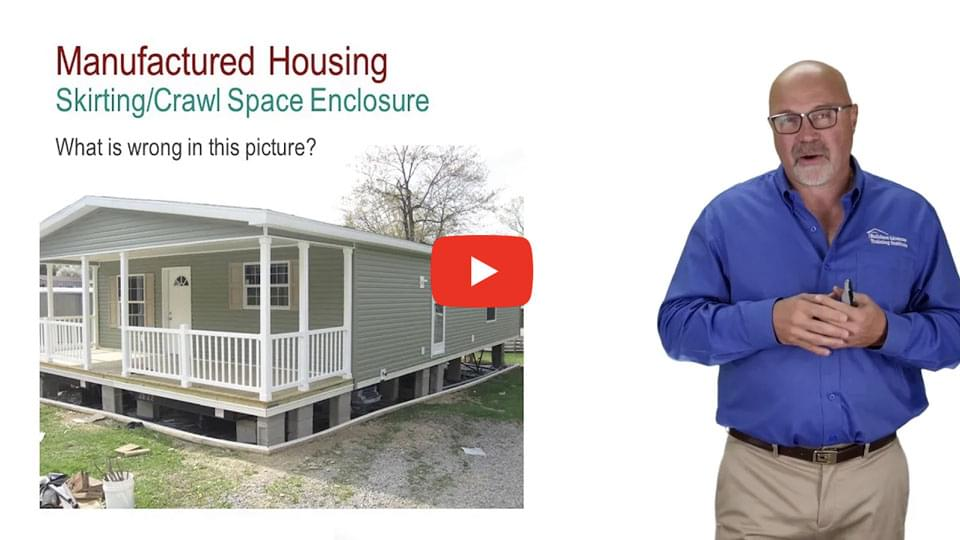 sample still-shot showing a mobile home on the right with an instructor on the left discussing manufactured housing.