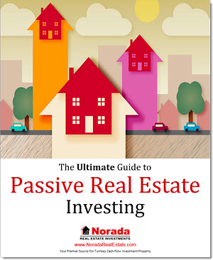 Cover of passive real estate investing guide with colorful graphics