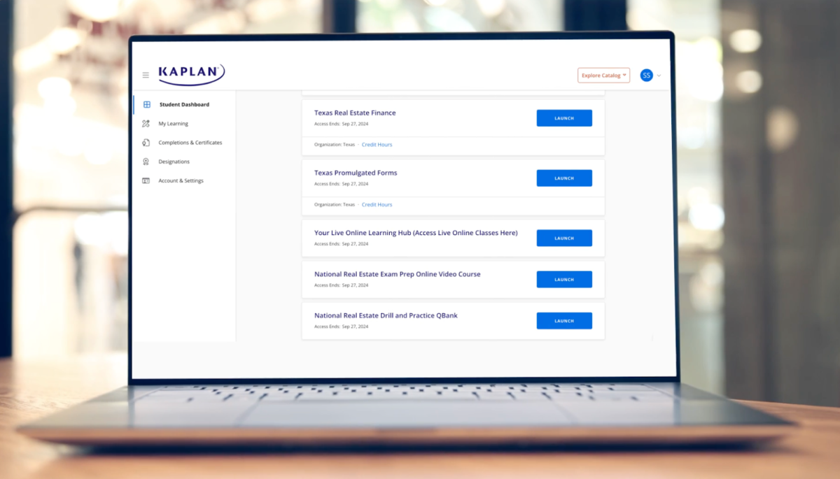 A laptop with Kaplan's student dashboard on the screen