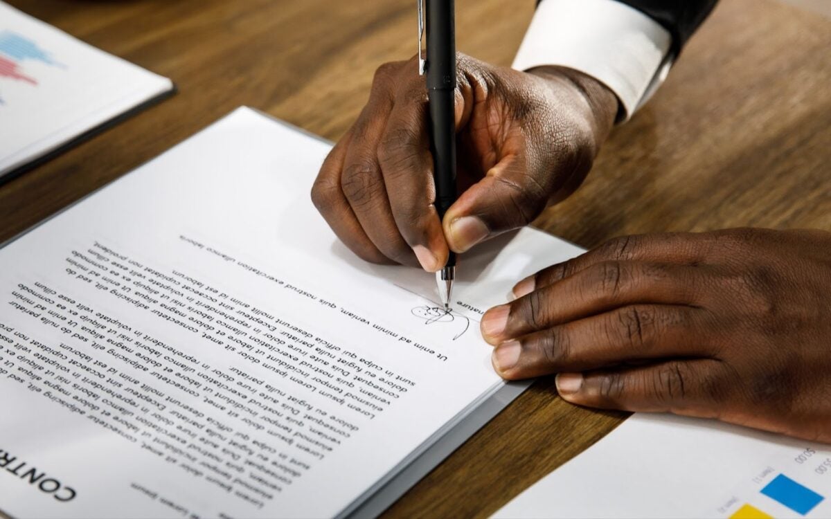 Real estate wholesaler signing a contract