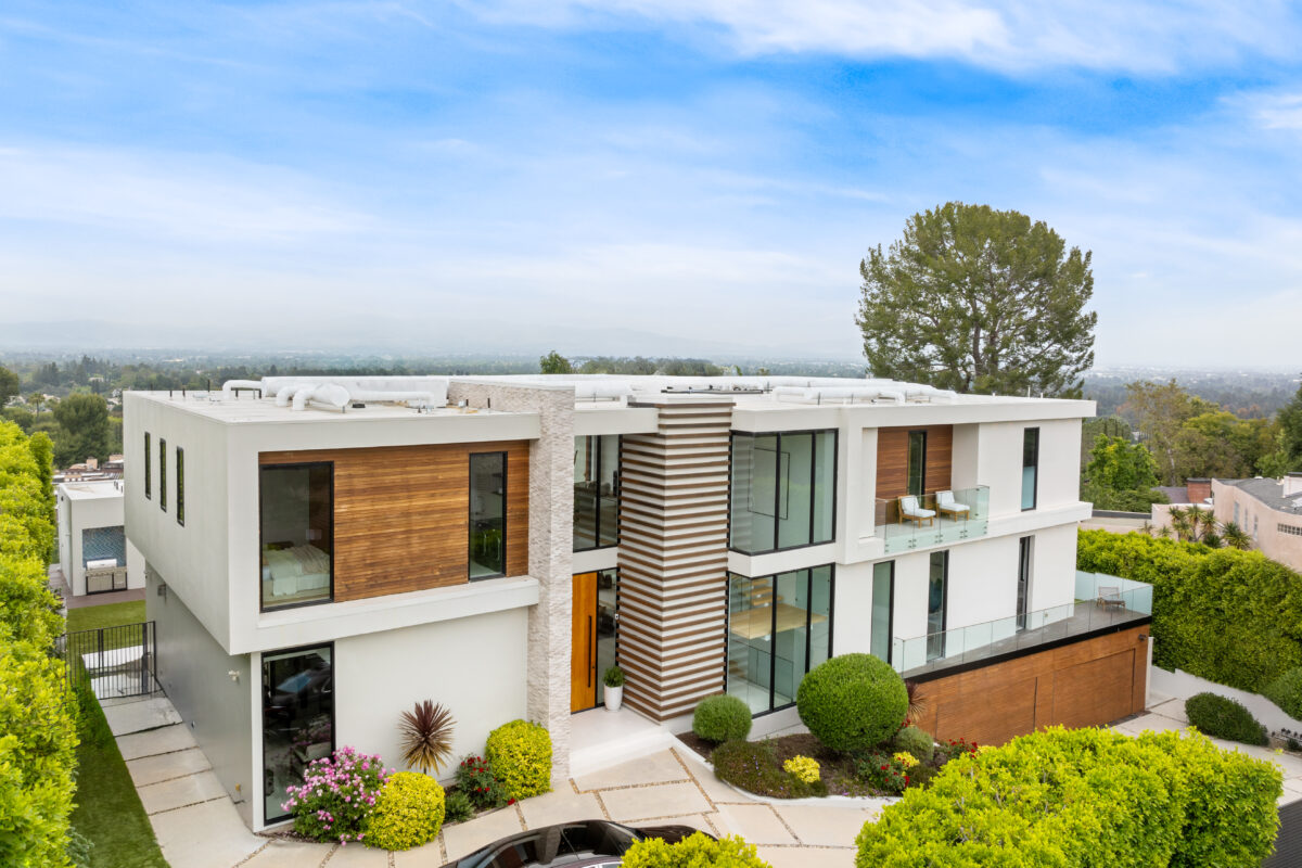 aerial-view-of-a-contemporary-home-with-a-lush-ga-2025-02-01-22-20-55-utc-1200x800.jpg