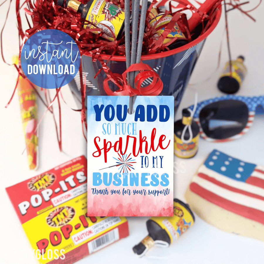 Sparklers and tag that says "You add so much sparkle to my business" with patriotic colors.