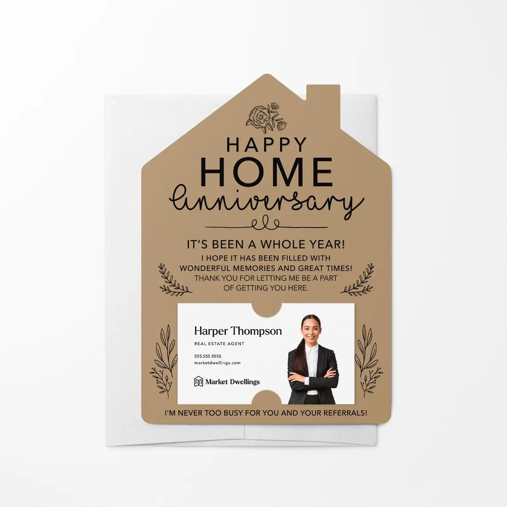 A house-shaped postcard that states "happy home anniversary". Underneath, there is a spot to insert your business card.