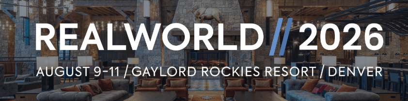 Banner for the RealWorld atop a Denver resort lobby.