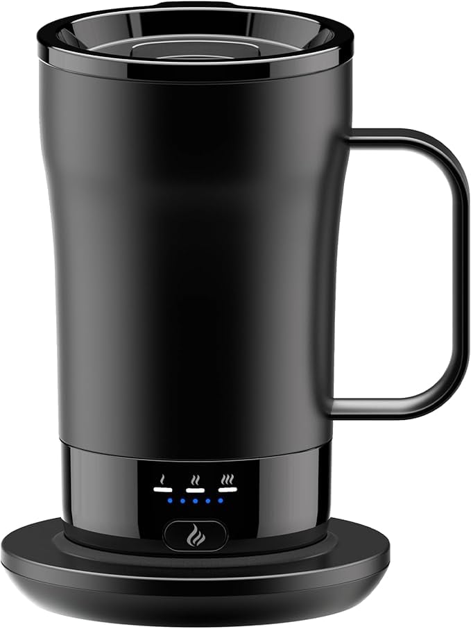 Black temperature controlled mug on a heating pad.