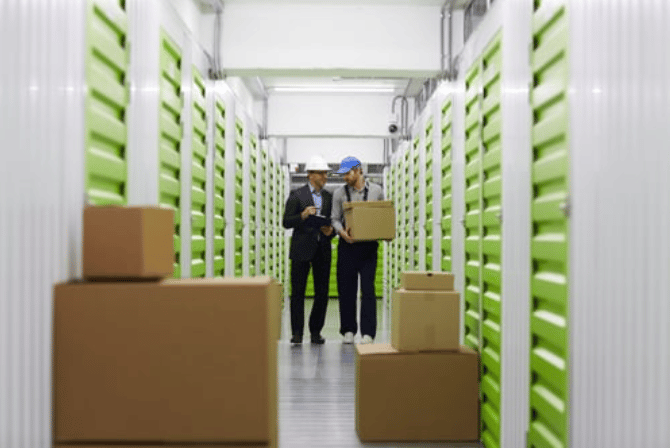 People working in a self storage facility