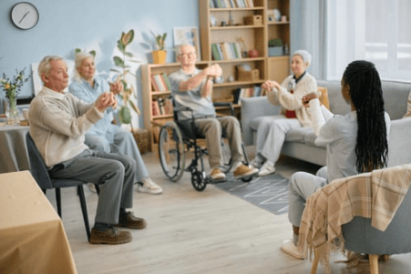 Seniors in Group Chair Exercise Activity