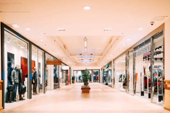 Shops with clothes at the modern shopping mall Shopping Centre